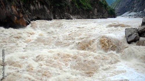 Tiger leaping gorge is a gorge formed by river Jinsha, the upper reach of the Yangtse river. It is a part of famous World Heritage Site Three Parallel rivers.