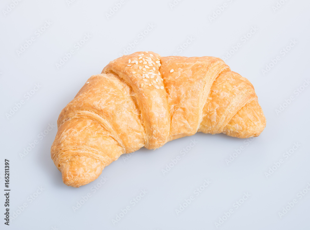 croissant or tasty croissant on the background.