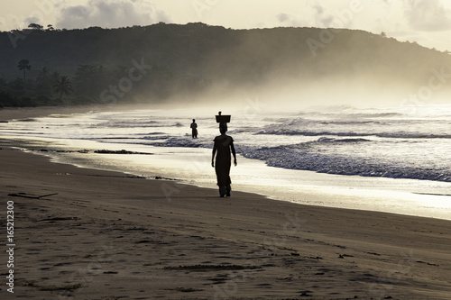Woman on beach Ghana coast
