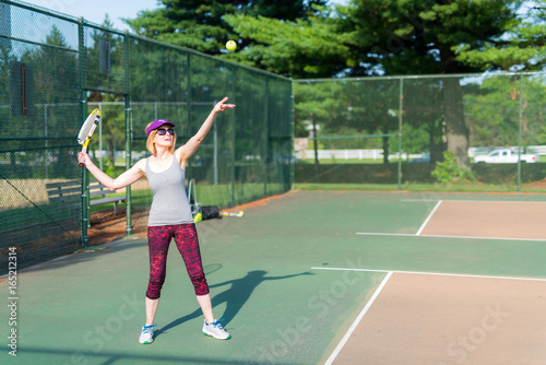 Sporty Caucasian Woman Playing Tennis © Terri