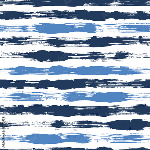 Vector seamless pattern with brush stripes and strokes. Blue color on white background. Hand painted grange texture. Ink geometric elements. Fashion modern style. Endless trend fabric print. Unusual