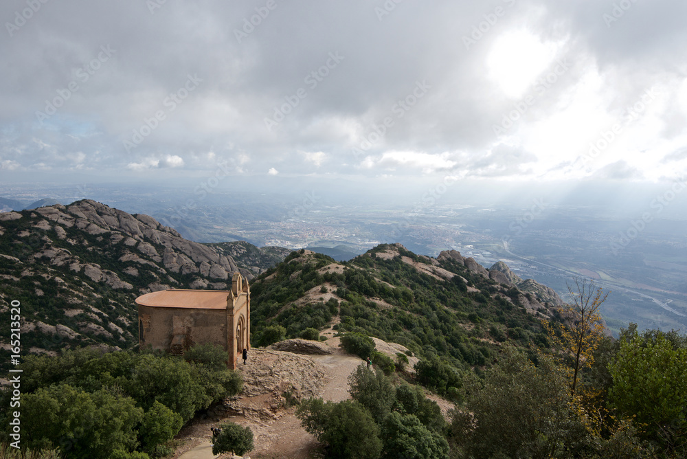 Scenic view of rocky mountains on a stormy day in Spain