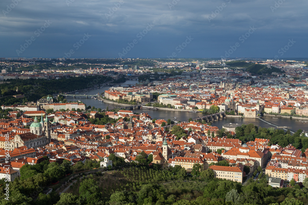 View of the Petrin Hill, Mala Strana (Lesser Town) and Old Town districts and beyond in Prague, Czech Republic, from above.
