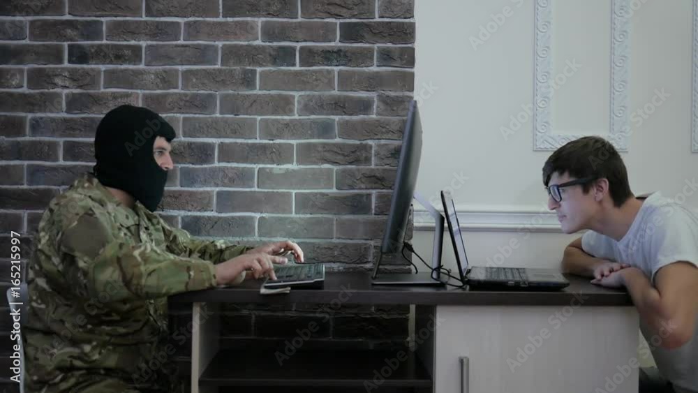 cyber terrorism, IT war, terrorist pay money to computer hacker, hand ...