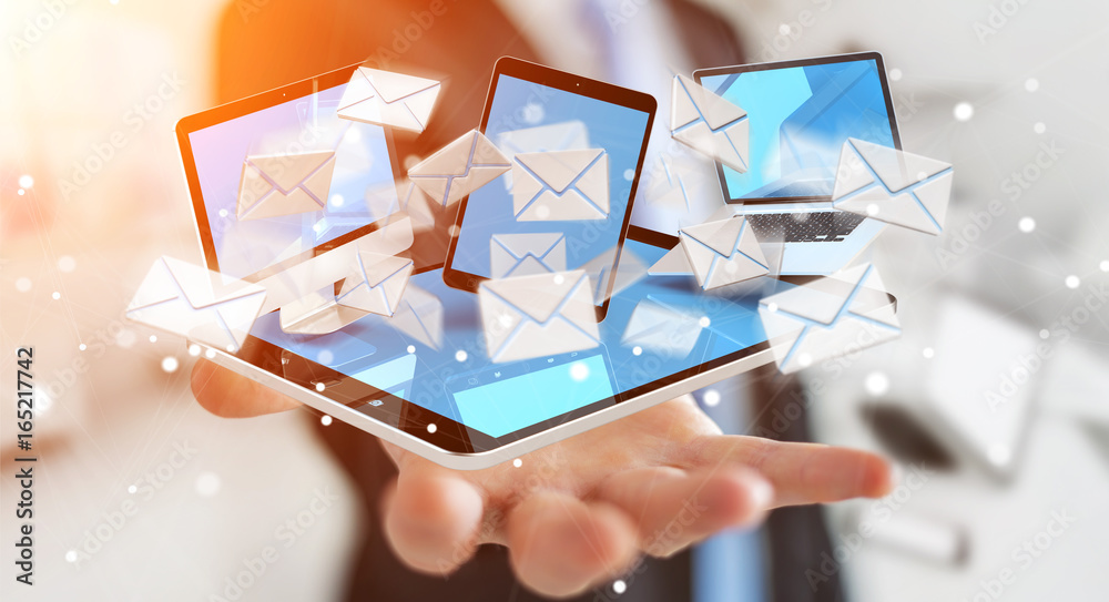 Businessman receiving e-mails on his digital devices 3D rendering Businessman receiving e-mails on his digital devices 3D rendering