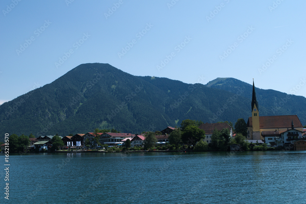 Boating on the Tegernsee with a view over church St.Laurentius