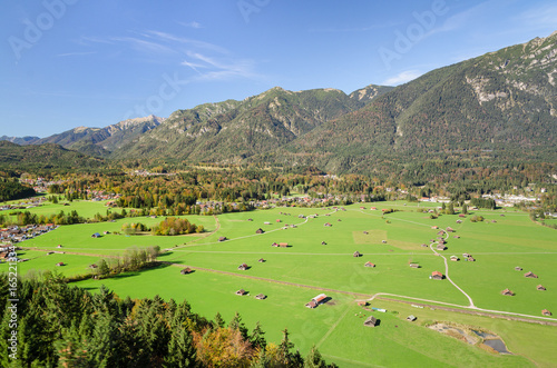 Obraz na plátně Alpine aerial view of Bavarian valley with green pastureland