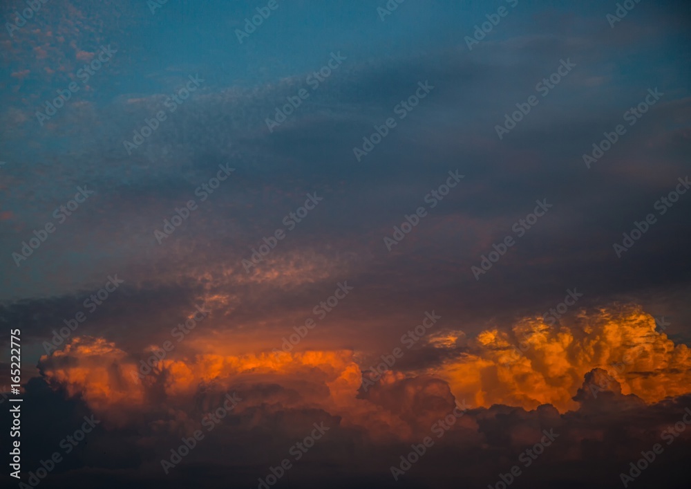 Naklejka premium By the evening sun illuminated cumulonimbus over the city of Erlangen in Germany
