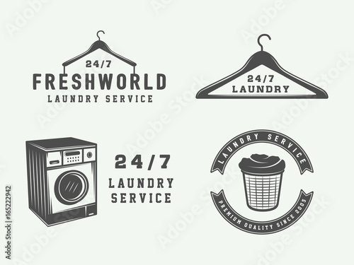 Set of vintage laundry, cleaning or iron service logos, emblems, badges and design elements. Monochrome Graphic Art. Vector Illustration.