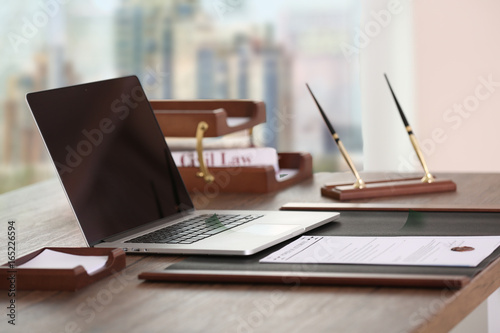 Workplace of lawyer in mode...
