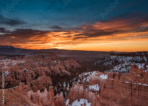 Snow Lingers on Bryce Canyon with Orange Sunrise