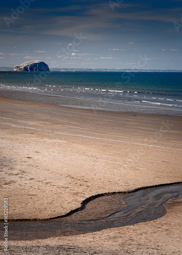 Bass Rock from Ravensheugh Sands on Sunny Day photo