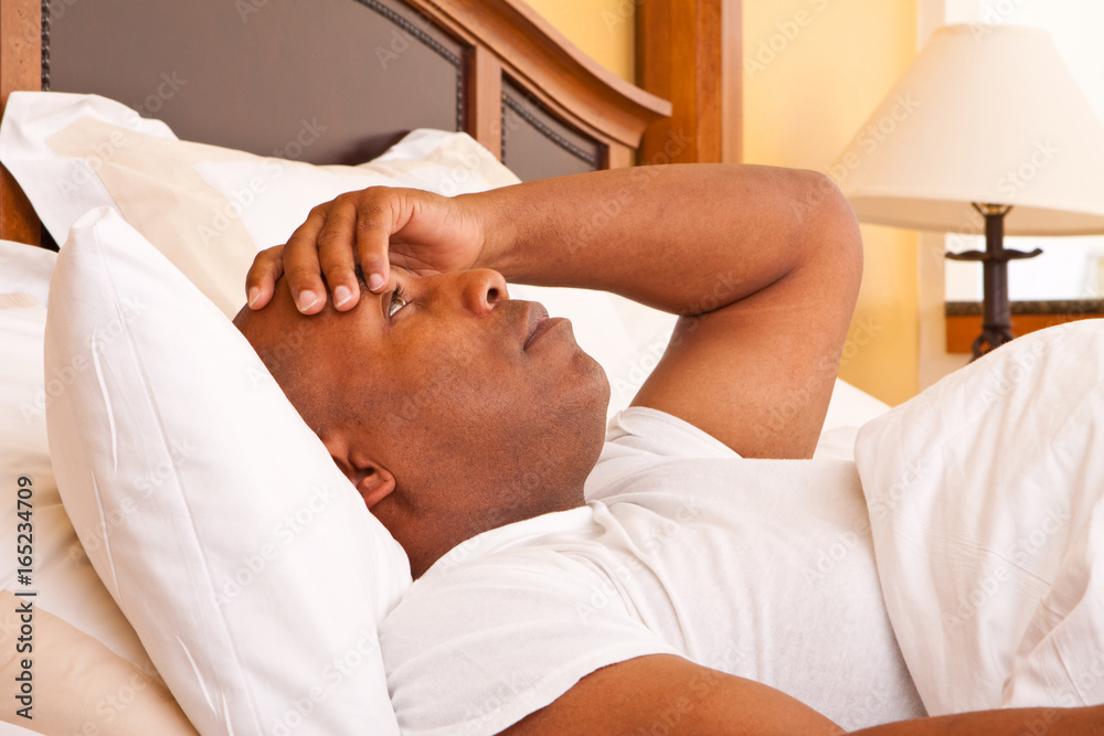 African American man having trouble sleeping. African American man having trouble sleeping.