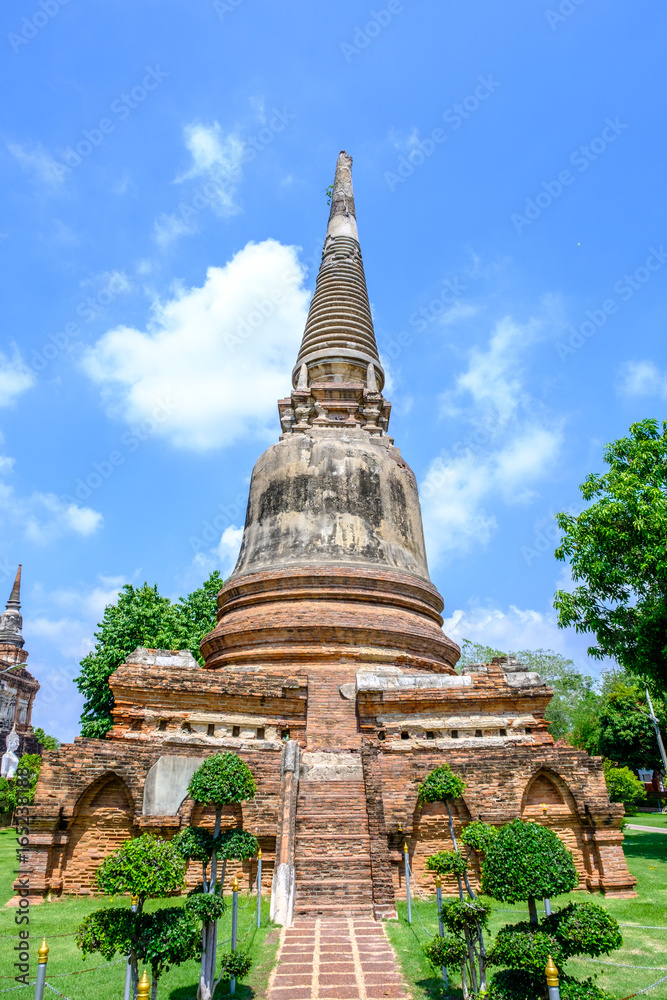 Old Pagoda with blue sky and cloud in Thailand