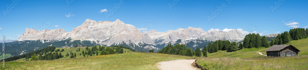 Fantastic landscape on the Dolomites. View on the peaks called Sas Crusc, Lavarela, Conturines and Pizes de Fanis. Place is Alta Badia, Sud Tirol, Italy Fantastic landscape on the Dolomites. View on the peaks called Sas Crusc, Lavarela, Conturines and Pizes de Fanis. Place is Alta Badia, Sud Tirol, Italy