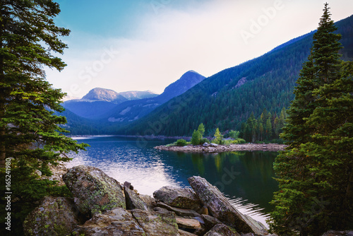 Fototapeta Naklejka Na Ścianę i Meble -  Serene Mountain Lake. Rocky Mountains Scenic Background. Beautiful Copy Space.