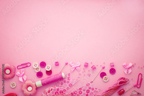 The Sewing tool or craft tool on pink background , top view or overhead shot with copy space