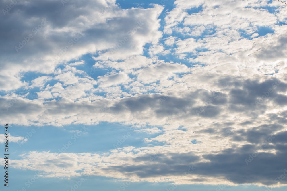 Photo of high blue sky with spindrift clouds background Photo of high blue sky with spindrift clouds background