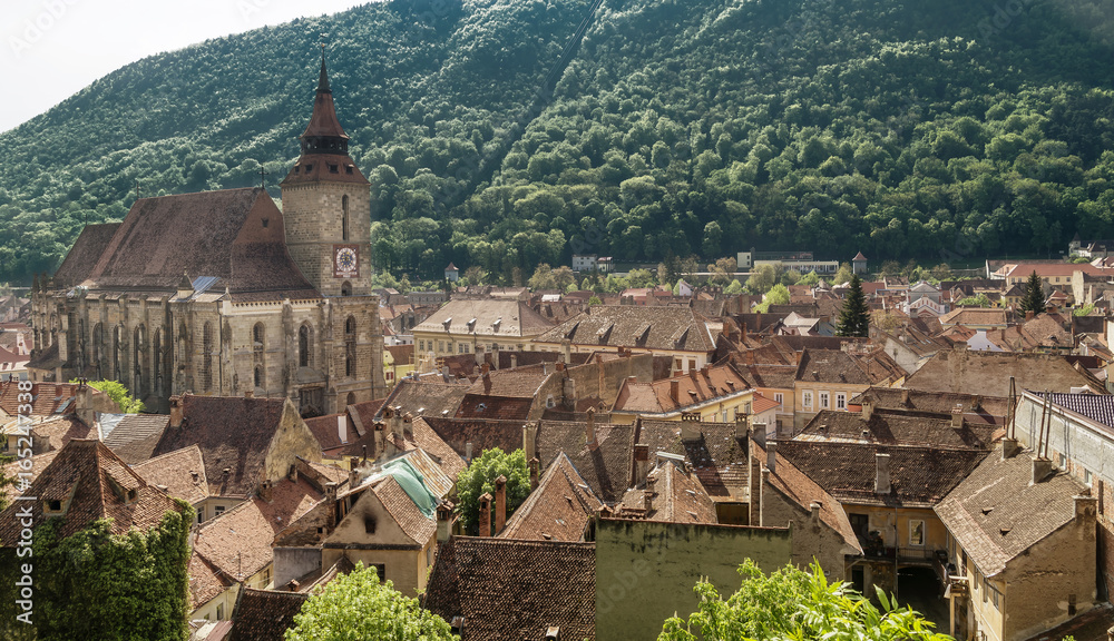 Top view of the famous Black Church of Brasov, Romania, which towers over the rooftops of the old town