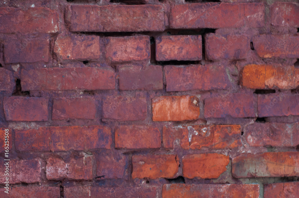 Classic artistic background: an old dilapidated brick wall. Classic artistic background: an old dilapidated brick wall.