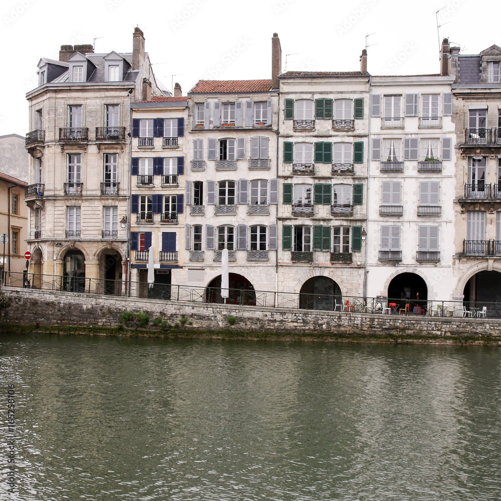 historic houses at the nive river in bayonne