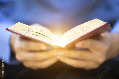 Fotografie, Obraz A man reading the Holy Bible.