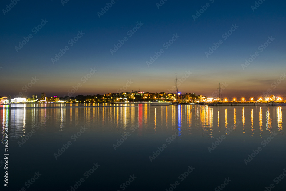 Water reflection of city lights Nessebar