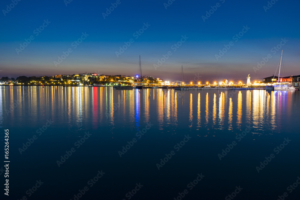 Water reflection of city lights Nessebar