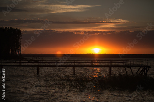 Wooden pier at sunset