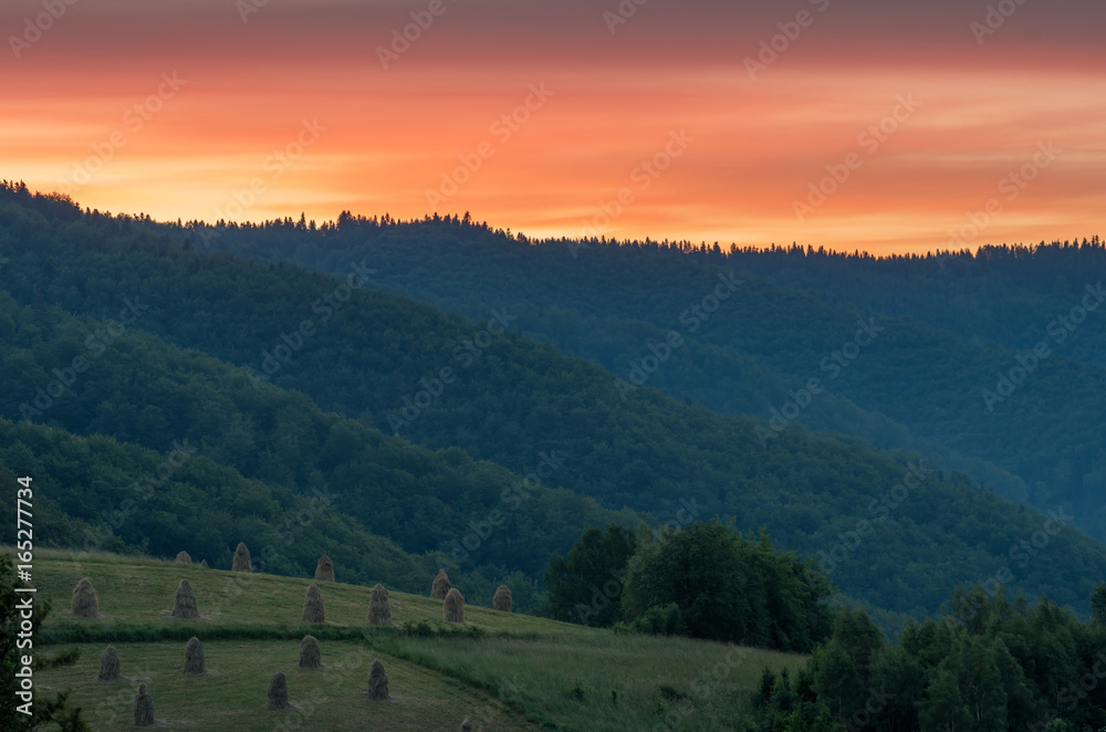 Moments before sunrise in cloudy Carpathian mountains, Poland