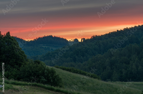 Moments before sunrise in cloudy Carpathian mountains, Poland