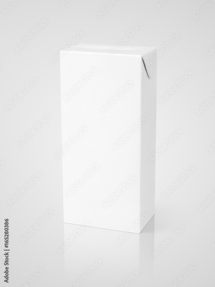 Milk or juice carton package on gray background with clipping path Milk or juice carton package on gray background with clipping path