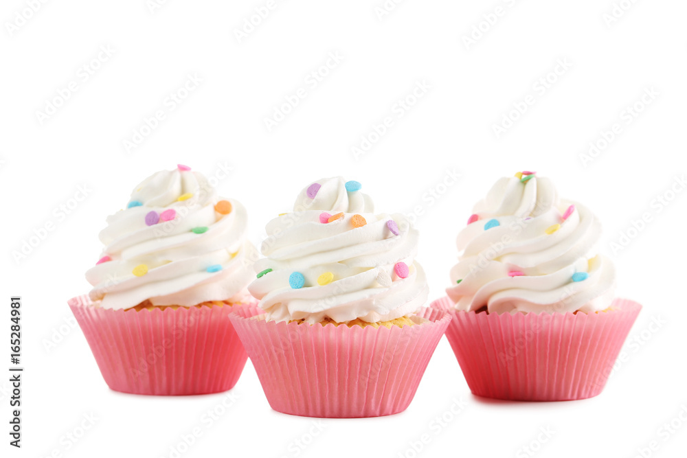 Tasty cupcakes isolated on a white Tasty cupcakes isolated on a white