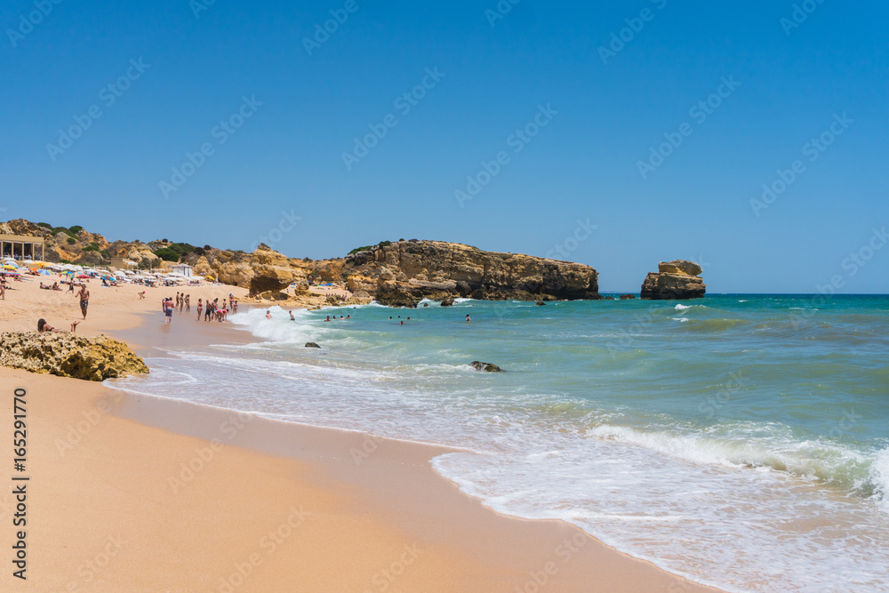 A view of a marvelous sandy beach portugal . Summer time
