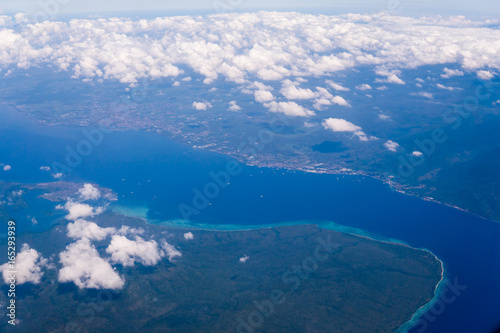 Indonesia tropical paradise crystal water turquoise aerial view from plane