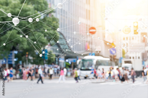 Big data , iot , artificial intelligence (ai) technology every where , smart city technology concept. Neural networks connect atoms and blur city people cross street background. 3d Rendering.