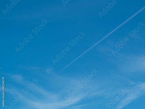 Blue sky with vapour trail