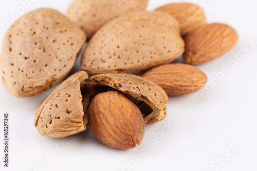 Whole almonds nuts isolated on white background