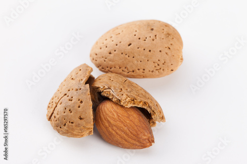 Whole almonds nuts isolated on white background