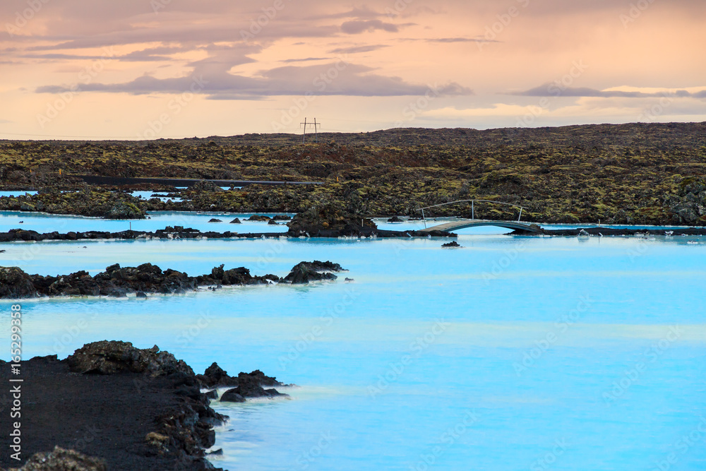 Blue lagoon waters in the lava field landscape of Iceland in winter Blue lagoon waters in the lava field landscape of Iceland in winter