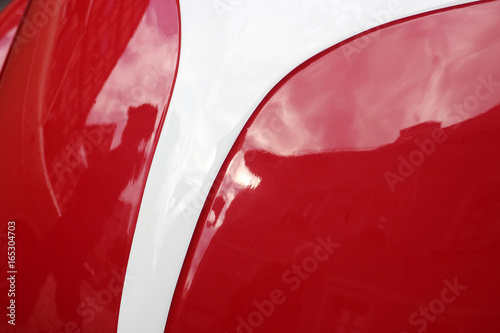 curved car form in red and white