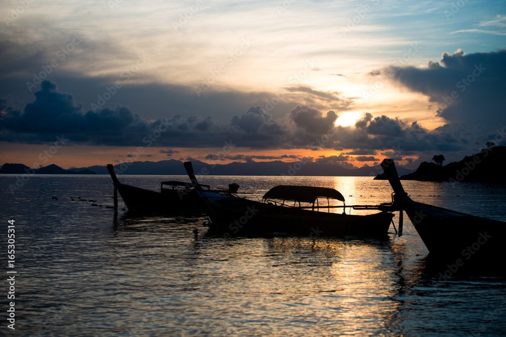 Beautiful sunset and Thai boats Beautiful sunset and Thai boats