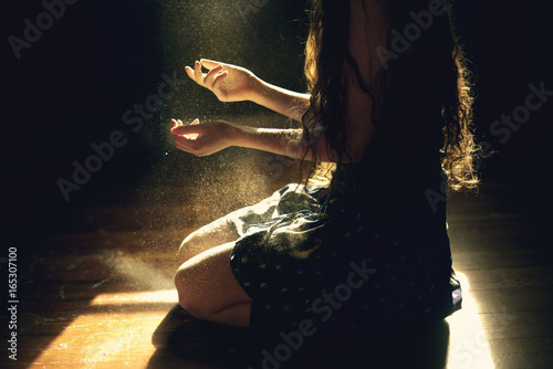 Woman catching flour 