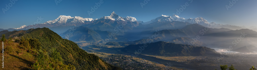 Panoramic view to the Himalayas from Sarangkot hill near Pokhara in Nepal