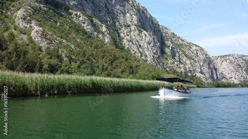 Omis, Croatia - June 23, 2017: Boat cruise on the canyon of the river Cetina © abrada