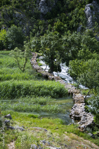 Kudin most (Kuda's bridge) in Krupa river canyon in Croatia photo