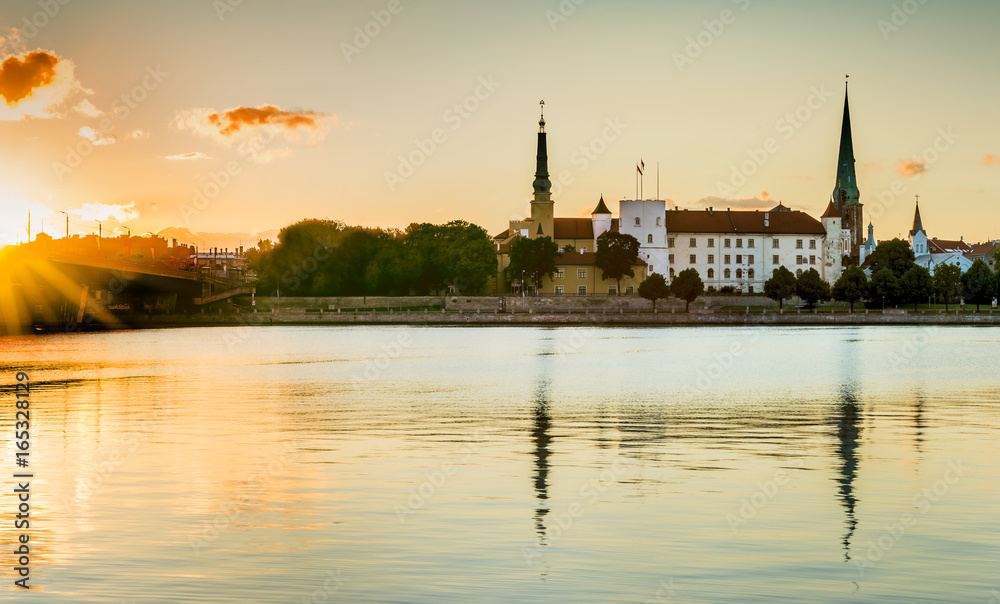 View on old  palace building and medieval churches in Riga city from left bank of the Daugava river