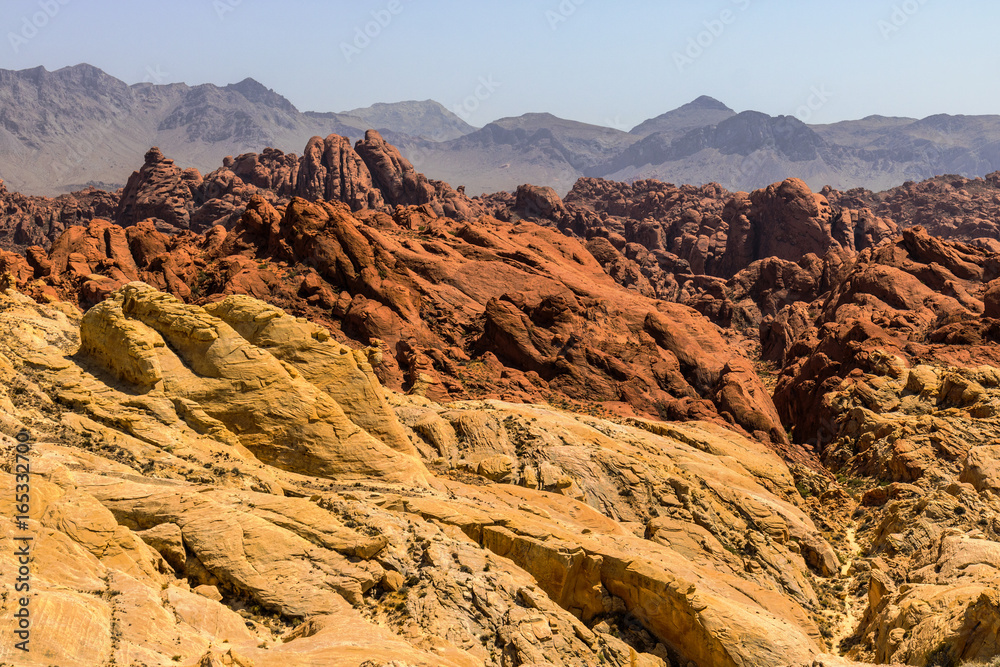 Naklejka premium Valley of Fire State Park with 40,000 acres of bright red Aztec sandstone outcrops nestled in gray and tan limestone I
