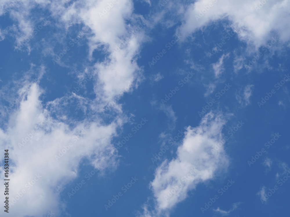 Obraz premium blue sky white clouds background