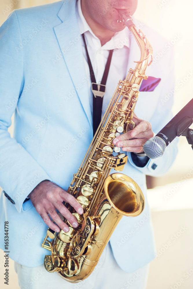 Fototapeta premium A man with saxophone